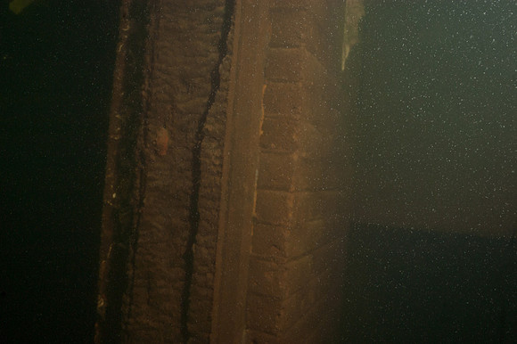 Exiting through the downstream arched window